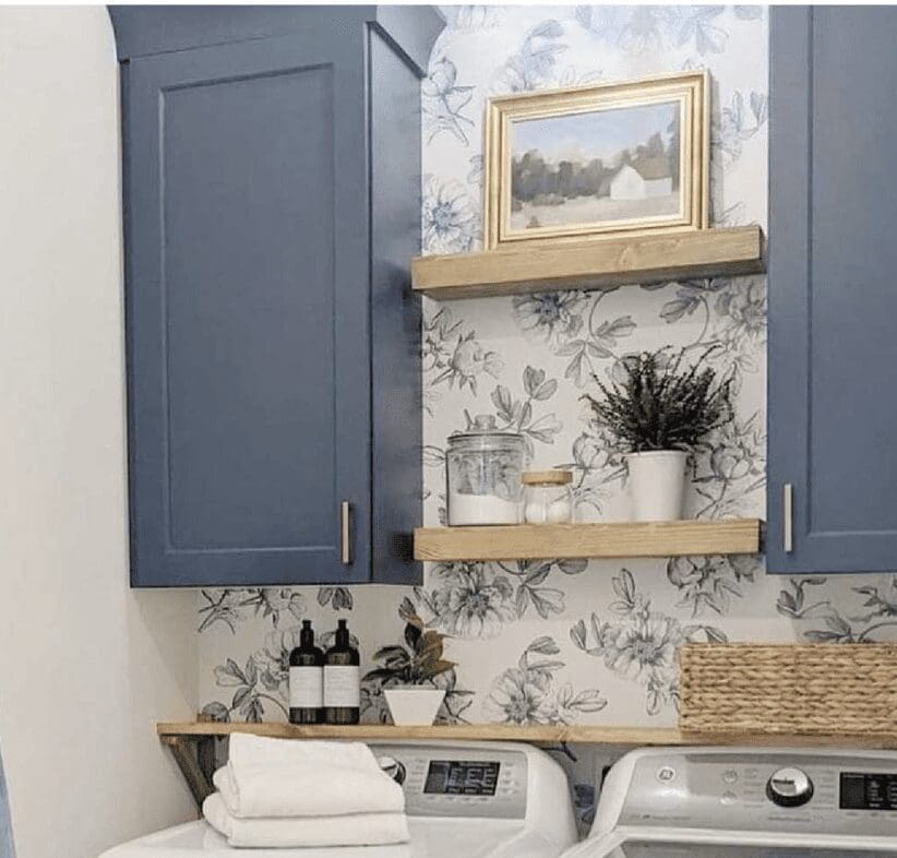 Picture of a laundry room that is market ready with new wallpaper
