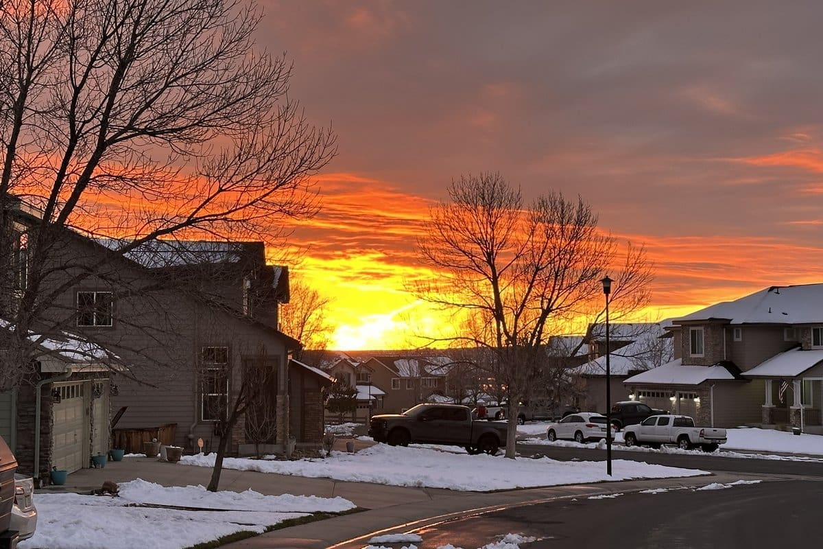 Littleton Colorado residential street at sunrise, spring 2026 sellers' market
